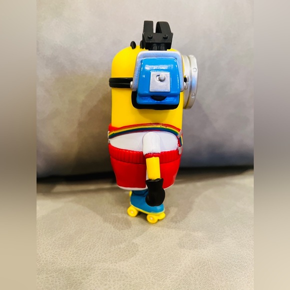 Despicable me figure Tim rollerskating with head phones. - Picture 4 of 4